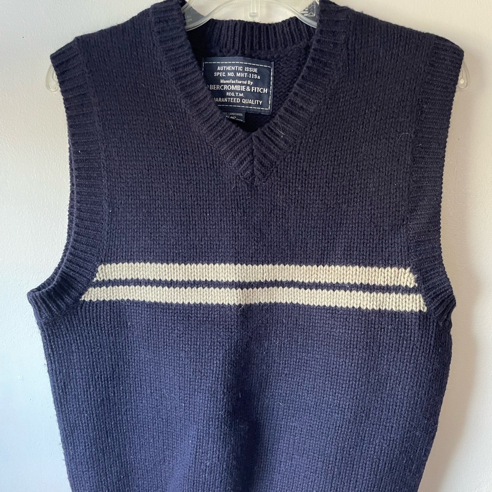 Mens v-neck vest. 80% lambs wool. Never worn.